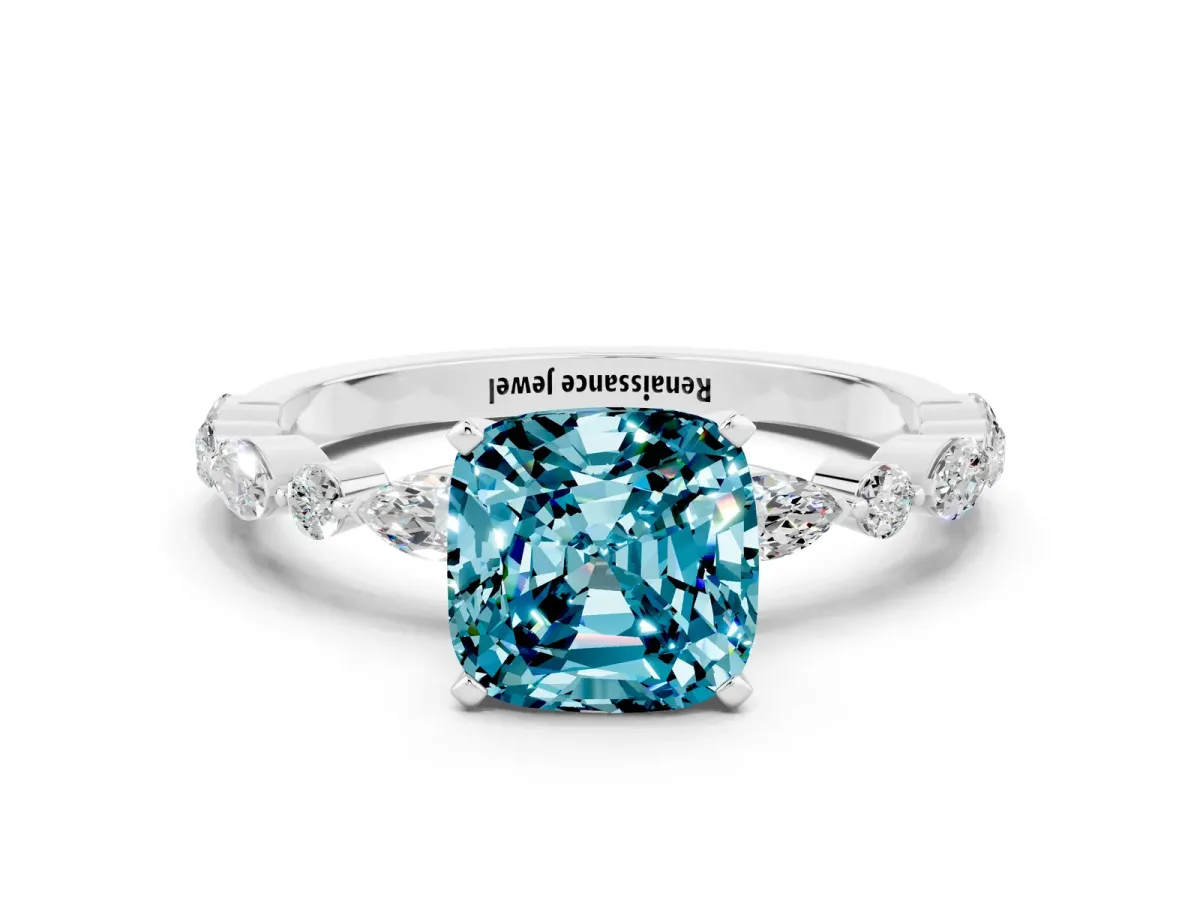 Cushion Cut Blue Topaz Ring with Marquise and Round Side Stones and Four-Prong Setting Silver