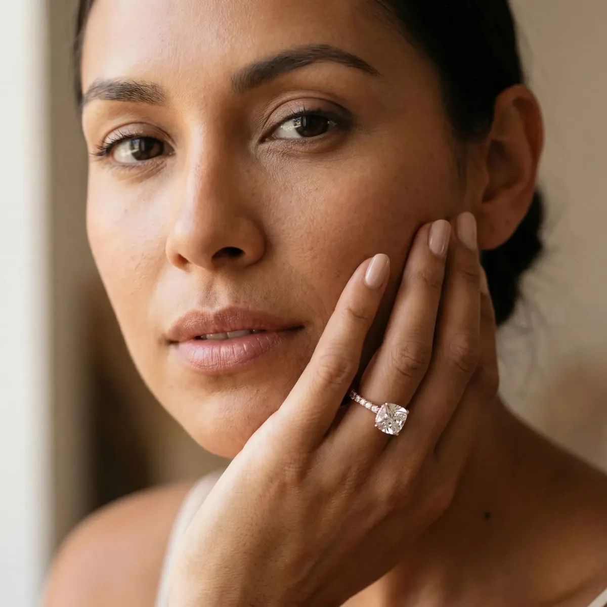 Cushion Cut Diamond Solitaire Ring with Round Pavé Band and Four-Prong Setting Rose gold