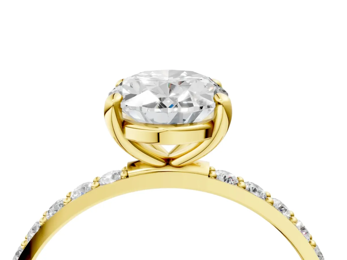 Oval Cut Diamond Solitaire Ring with Round Moissanite Pavé Band and Prong Setting Yellow gold