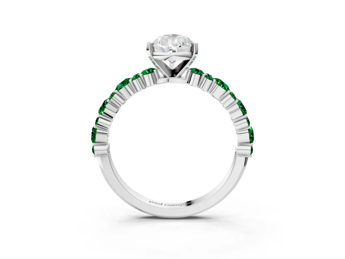 Pear Cut Diamond Side Stone Solitaire Ring with Round Emerald and Four-Prong Setting Silver