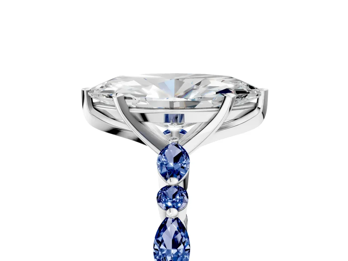 Marquise Cut Diamond Ring with Marquise and Round Blue Sapphire Side Stones and Four-Prong Setting Silver
