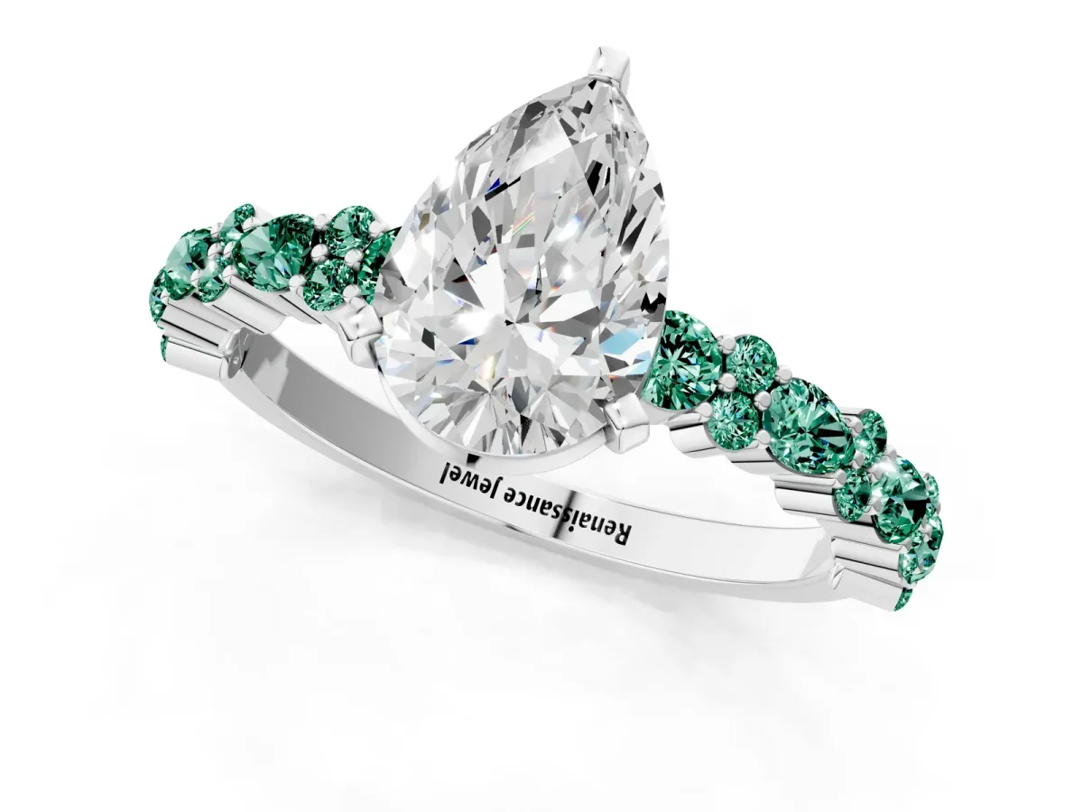 Pear Cut Diamond Side Stone Solitaire Ring with Round Green Sapphire and Four-Prong Setting Platinum