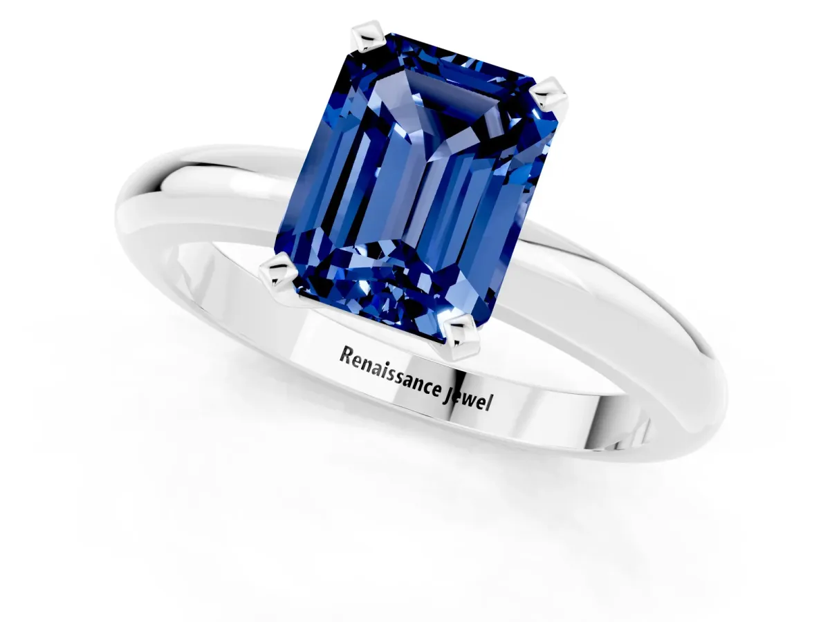 Emerald Cut Blue Sapphire Solitaire Engagement Ring with Round Band and Four-Prong Setting Platinum