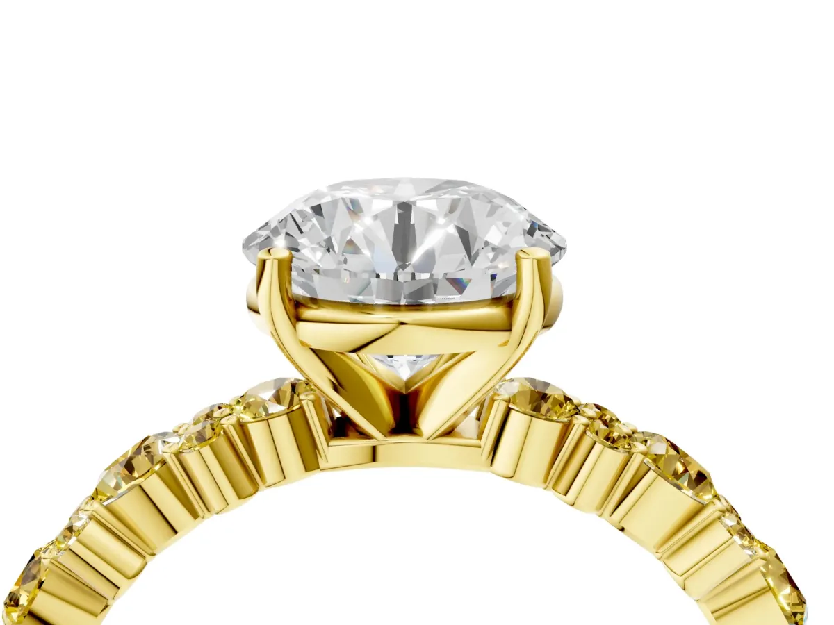 Round Cut Diamond Side Stone Solitaire Ring with Round Yellow Sapphire and Four-Prong Setting Yellow gold