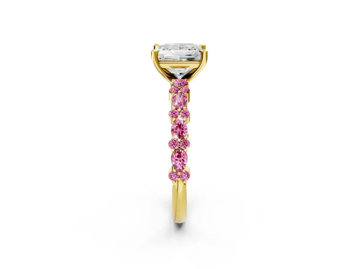 Princess Cut Diamond Side Stone Solitaire Ring with Round Pink Sapphire and Four-Prong Setting Yellow gold