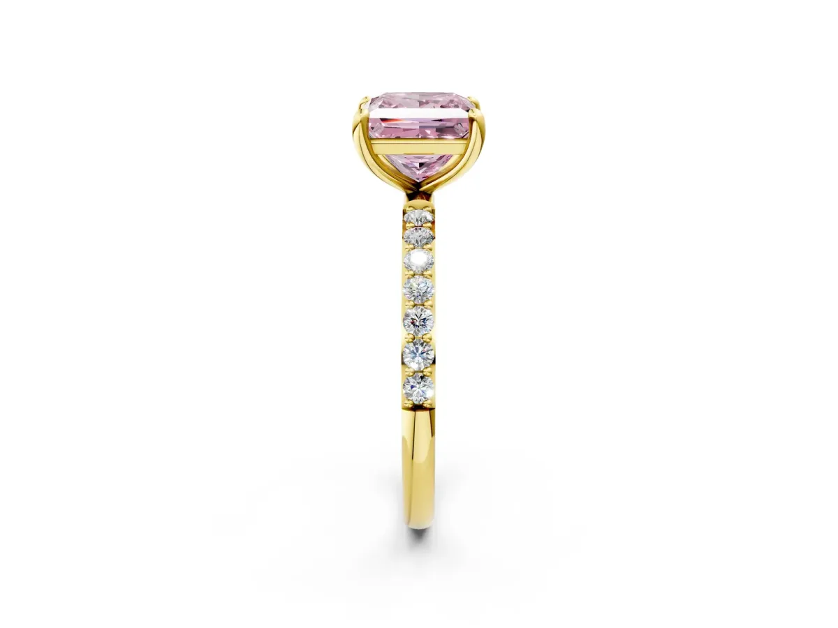 Fancy Pink Princess Cut Diamond Solitaire Ring with Round Pavé Band and Prong Setting Yellow gold