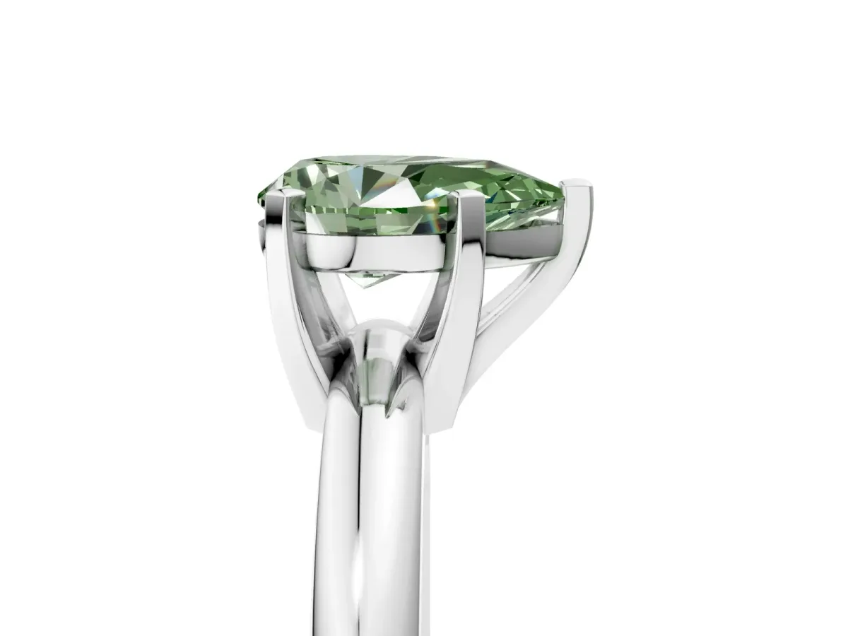 Fancy Green Pear Cut Diamond Solitaire Engagement Ring with Round Band and Four-Prong Setting Silver