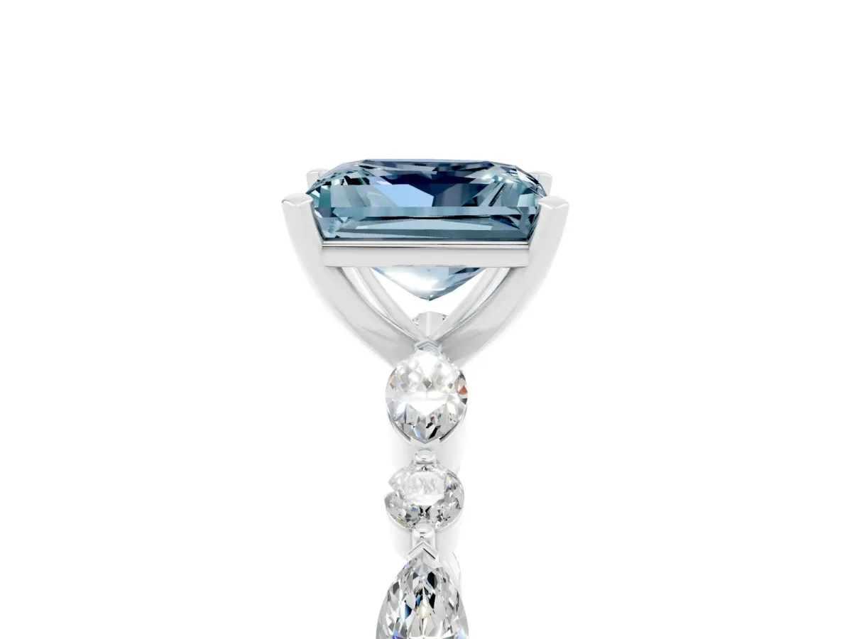 Princess Cut Aquamarine Ring with Marquise and Round Side Stones and Four-Prong Setting Silver