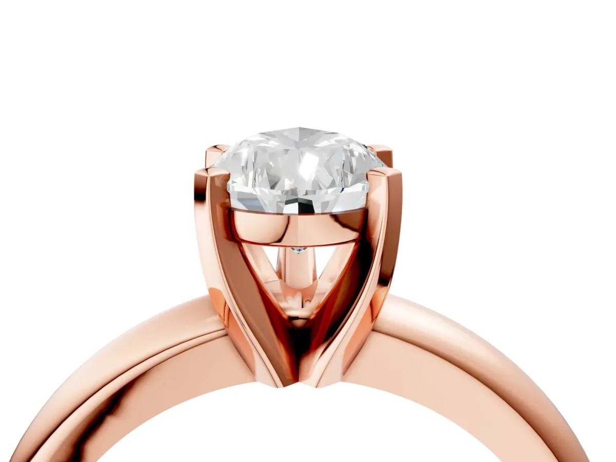 Pear Cut Diamond Solitaire Engagement Ring with Round Band and Four-Prong Setting Rose gold