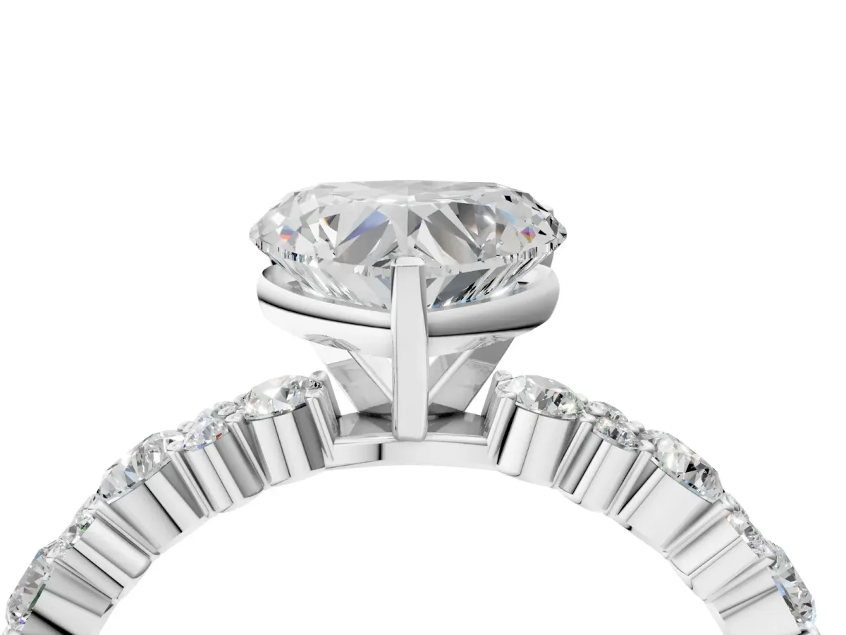 Heart Cut Diamond Side Stone Solitaire Ring with Round and Four-Prong Setting Platinum
