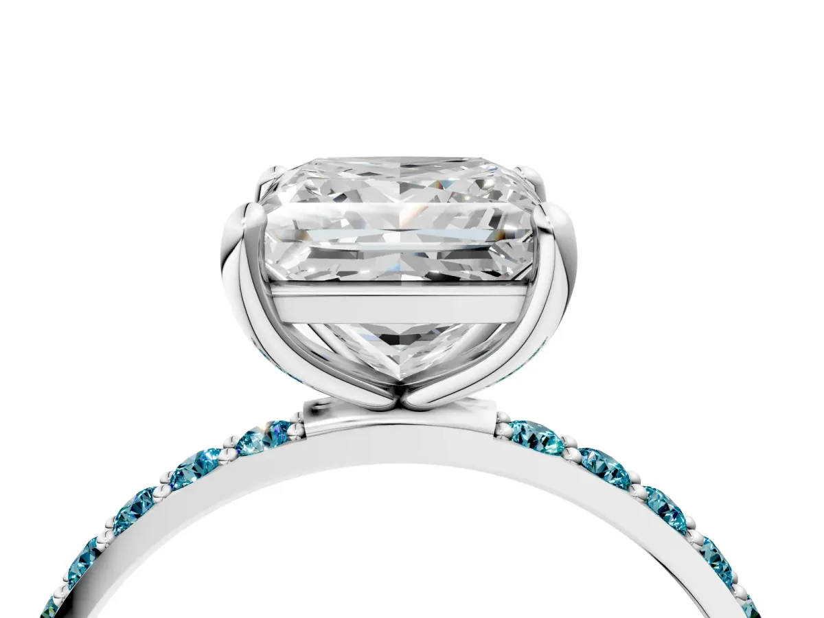 Princess Cut Diamond Solitaire Ring with Round Blue Topaz Pavé Band and Prong Setting Silver