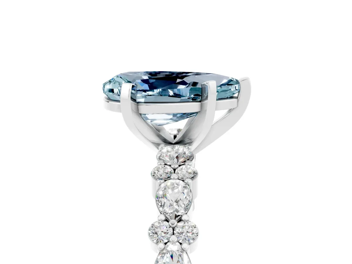 Pear Cut Aquamarine Side Stone Solitaire Ring with Round and Four-Prong Setting White gold