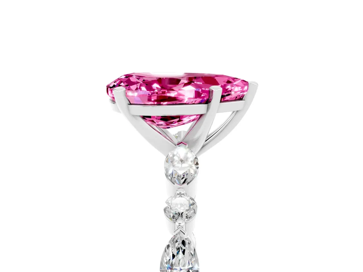 Pear Cut Pink Sapphire Ring with Marquise and Round Side Stones and Four-Prong Setting Silver