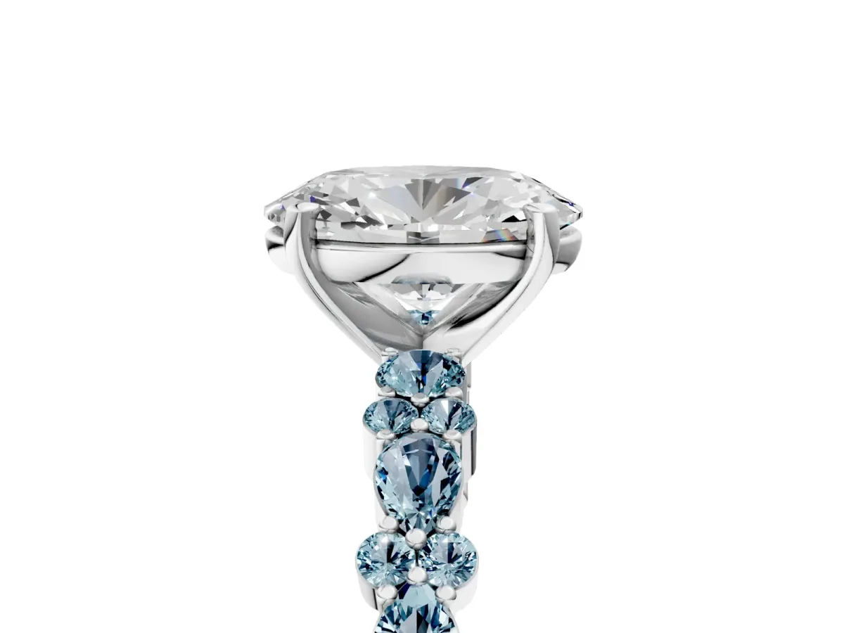 Oval Cut Diamond Side Stone Solitaire Ring with Round Aquamarine and Four-Prong Setting White gold