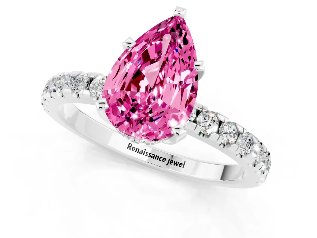 Pear Cut Pink Sapphire Solitaire Ring with Round Pavé Band and Four-Prong Setting Silver