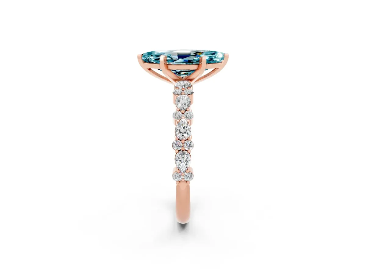 Marquise Cut Blue Topaz Side Stone Solitaire Ring with Round and Four-Prong Setting Rose gold