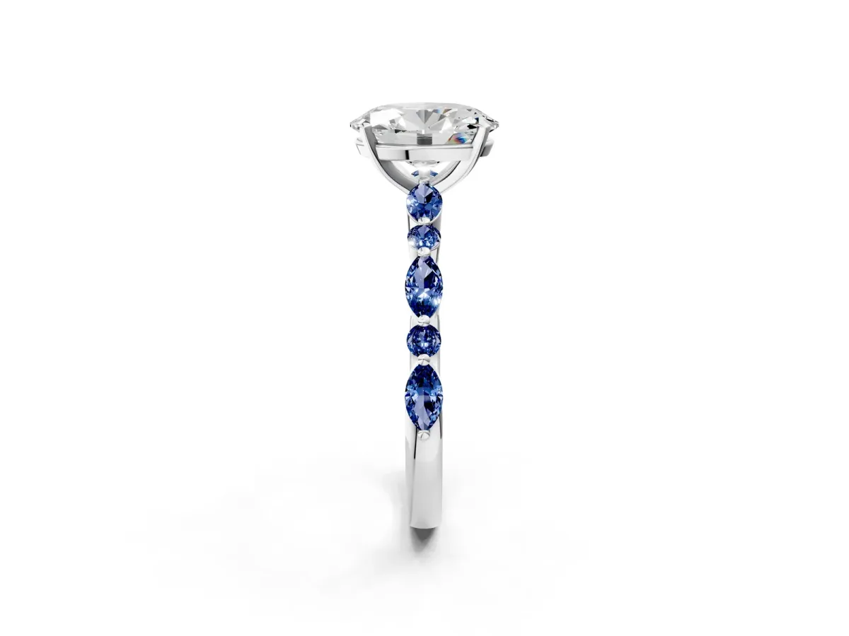 Oval Cut Diamond Ring with Marquise and Round Blue Sapphire Side Stones and Four-Prong Setting Silver