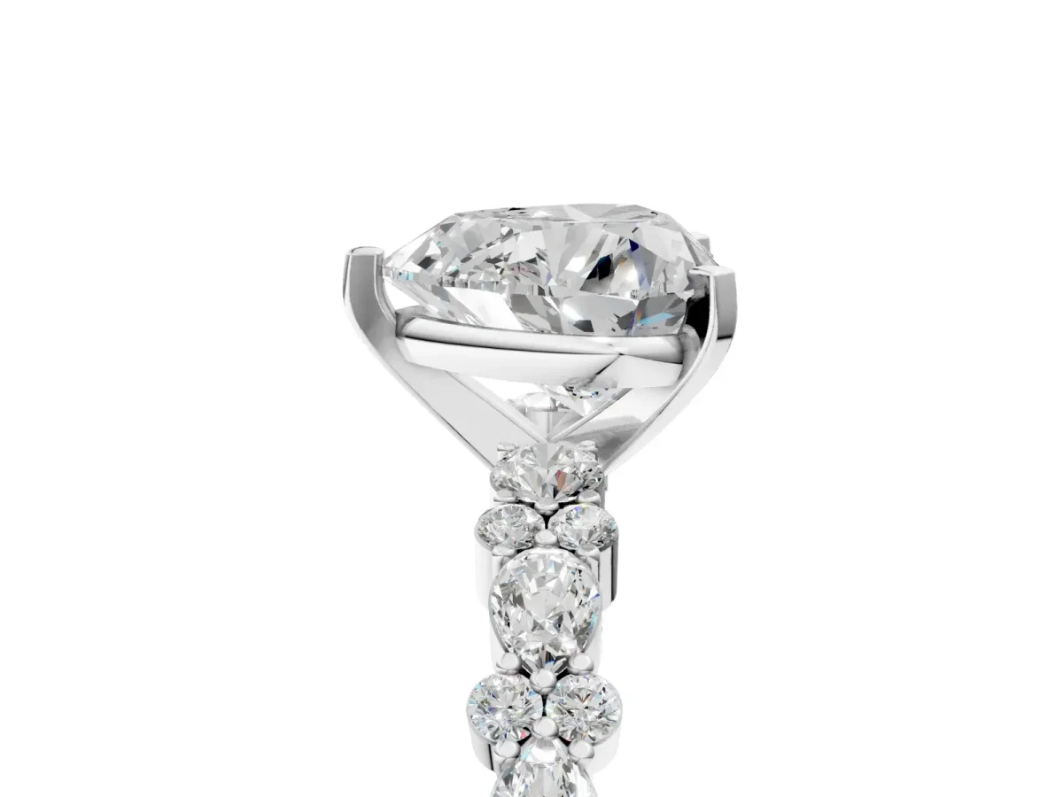 Heart Cut Diamond Side Stone Solitaire Ring with Round and Four-Prong Setting Platinum