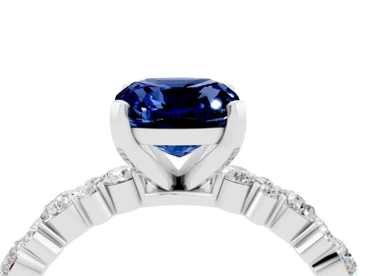 Cushion Cut Blue Sapphire Side Stone Solitaire Ring with Round and Four-Prong Setting Platinum