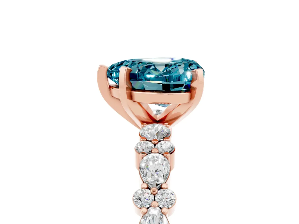 Heart Cut Blue Topaz Side Stone Solitaire Ring with Round and Four-Prong Setting Rose gold