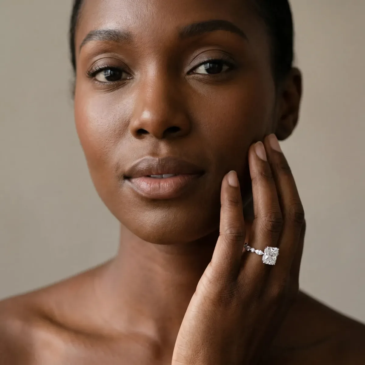 Radiant Cut Diamond Ring with Marquise and Round Side Stones and Four-Prong Setting Silver