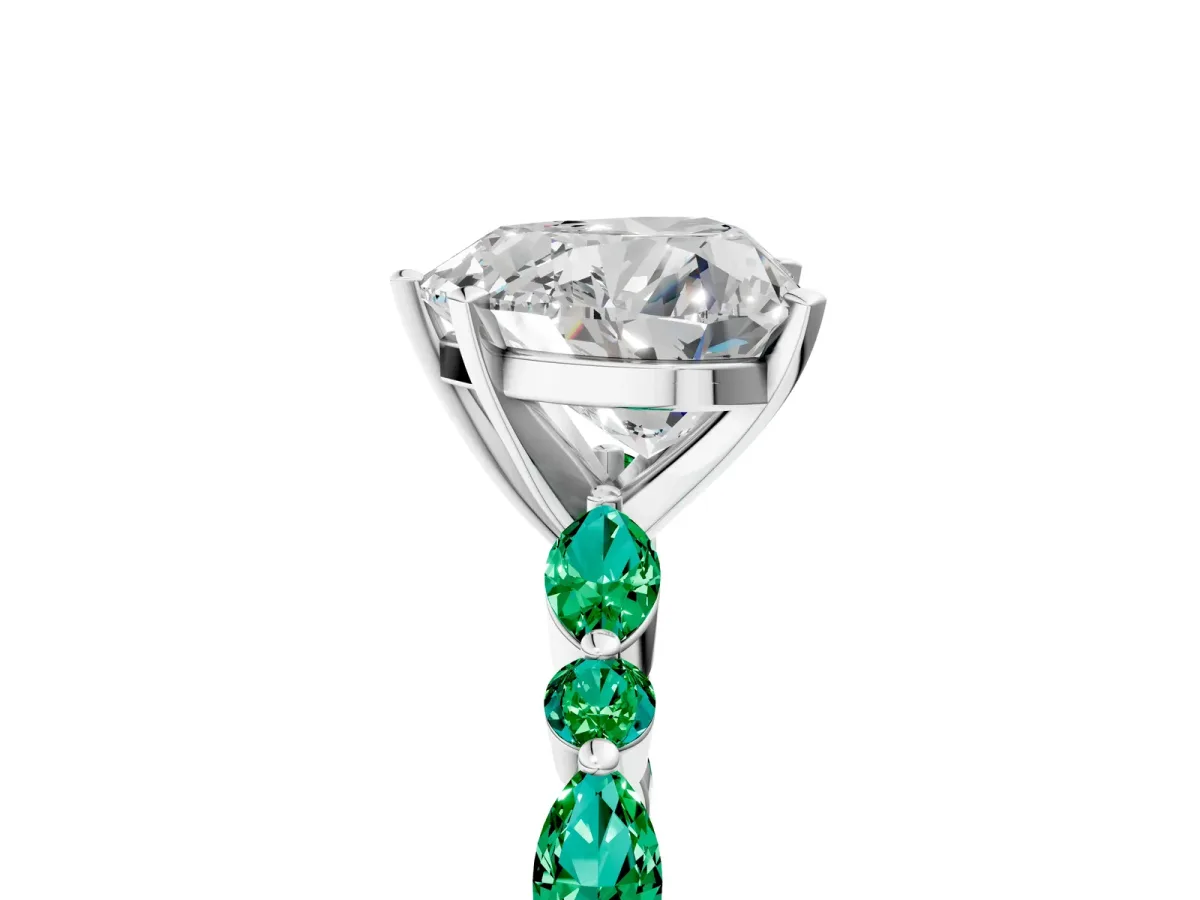 Heart Cut Diamond Ring with Marquise and Round Emerald Side Stones and Four-Prong Setting Platinum