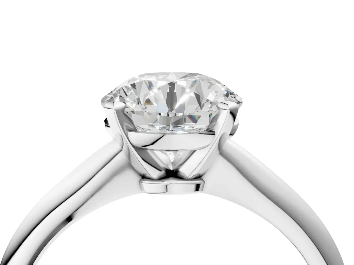 Round Cut Diamond Solitaire Engagement Ring with Classic Band and Four-Prong Setting White gold