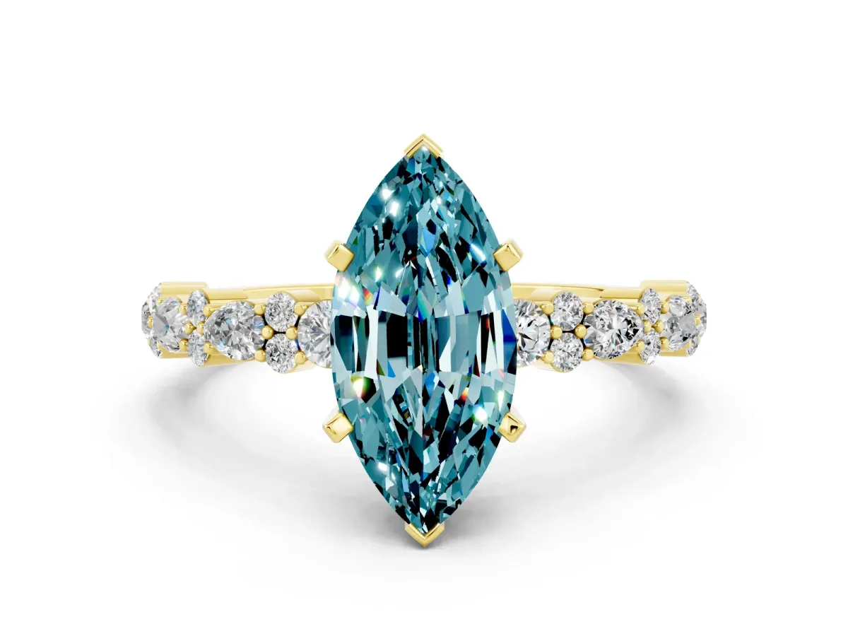 Marquise Cut Blue Topaz Side Stone Solitaire Ring with Round and Four-Prong Setting Yellow gold