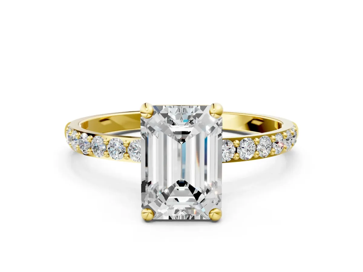 Emerald Cut Diamond Solitaire Ring with Round Moissanite Pavé Band and Prong Setting Yellow gold