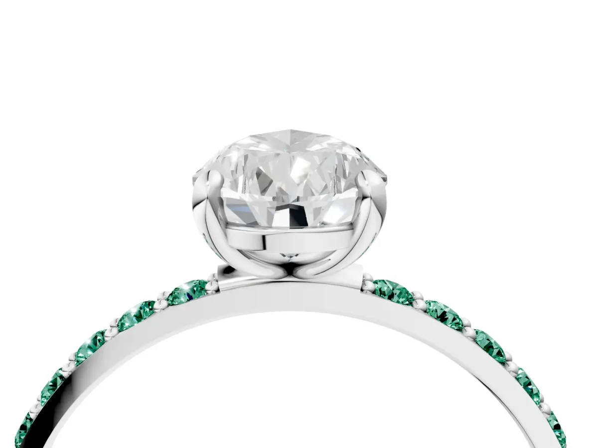 Pear Cut Diamond Solitaire Ring with Round Green Sapphire Pavé Band and Prong Setting Platinum