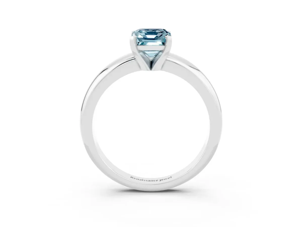 Emerald Cut Aquamarine Solitaire Engagement Ring with Round Band and Four-Prong Setting Platinum