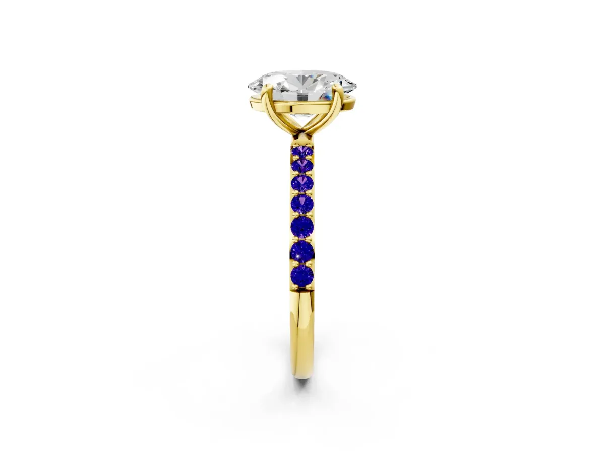 Oval Cut Diamond Solitaire Ring with Round Tanzanite Pavé Band and Prong Setting Yellow gold
