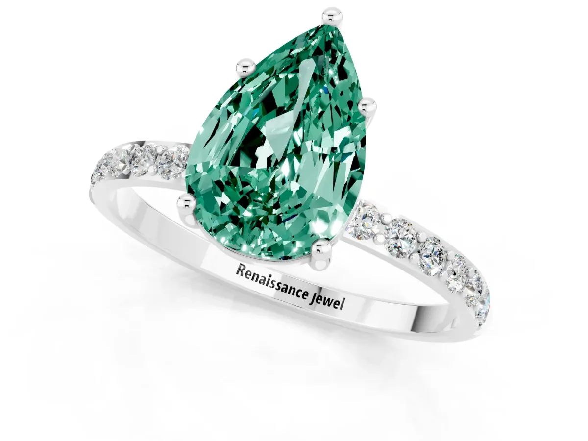 Pear Cut Green Sapphire Solitaire Ring with Round Pavé Band and Prong Setting Platinum