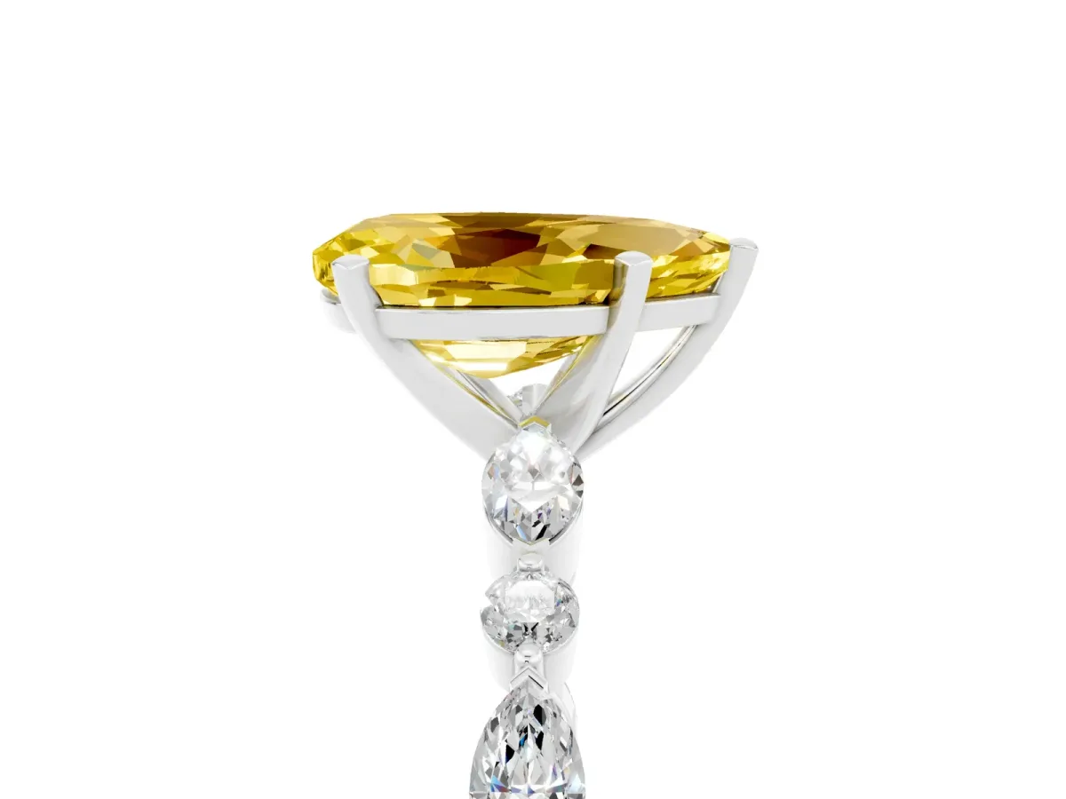 Pear Cut Yellow Sapphire Ring with Marquise and Round Side Stones and Four-Prong Setting Silver