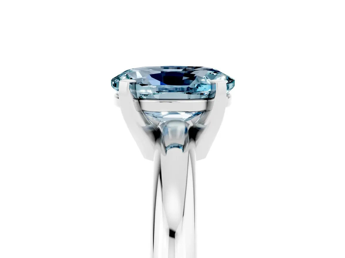 Oval Cut Aquamarine Solitaire Engagement Ring with Round Band and Four-Prong Setting Platinum