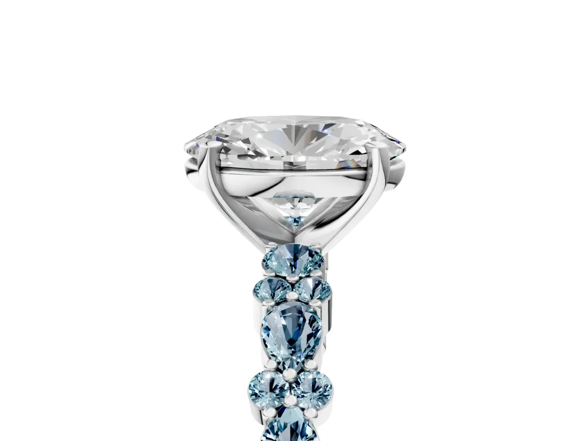 Oval Cut Diamond Side Stone Solitaire Ring with Round Aquamarine and Four-Prong Setting White gold