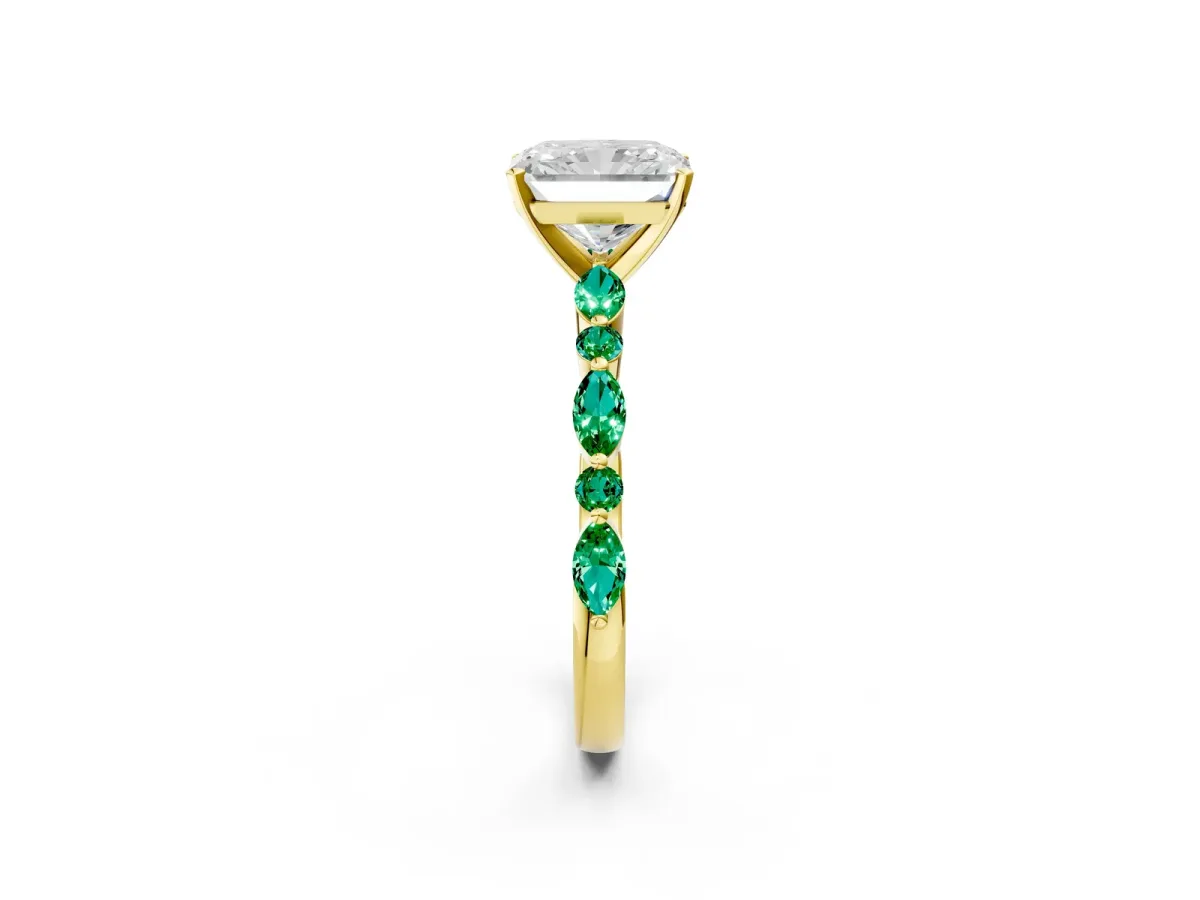 Radiant Cut Diamond Ring with Marquise and Round Emerald Side Stones and Four-Prong Setting Yellow gold