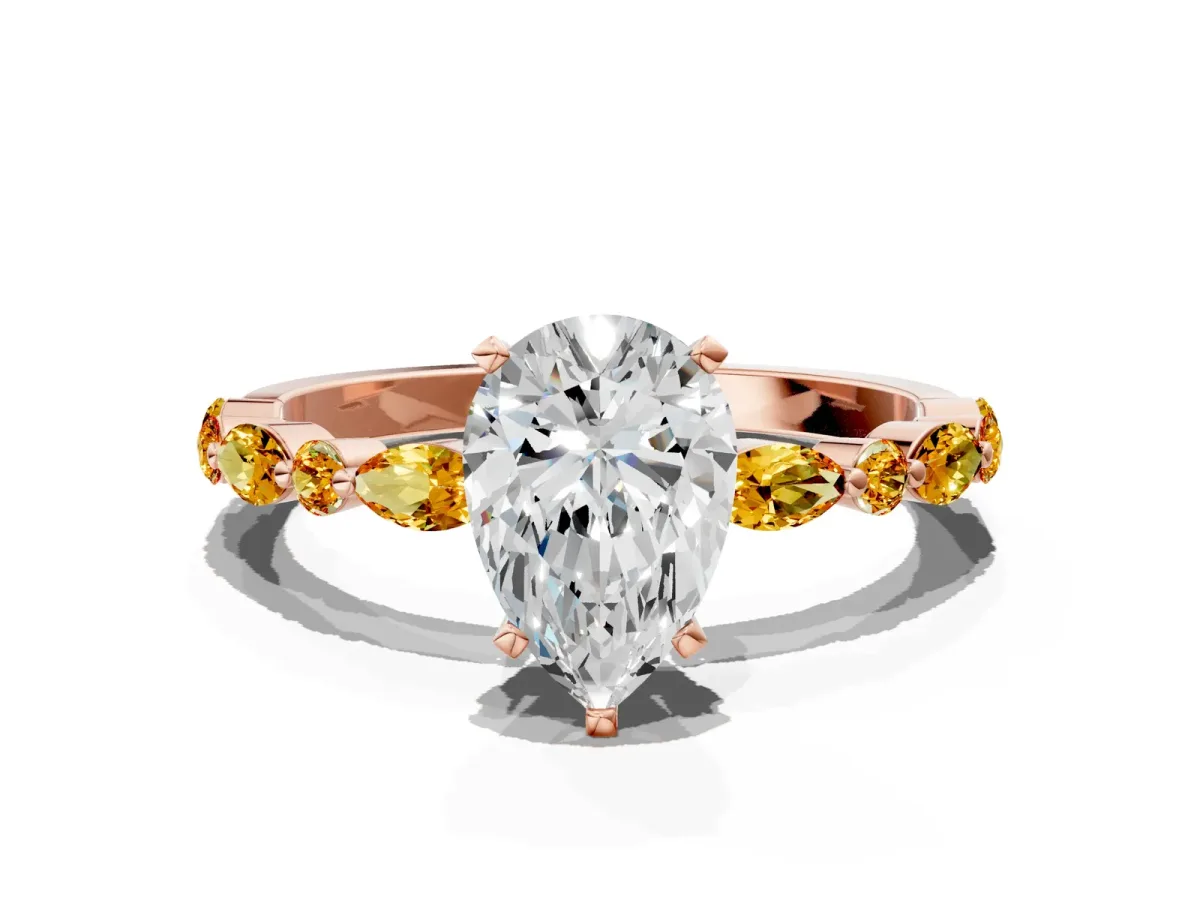 Pear Cut Diamond Ring with Marquise and Round Citrine Side Stones and Four-Prong Setting Rose gold