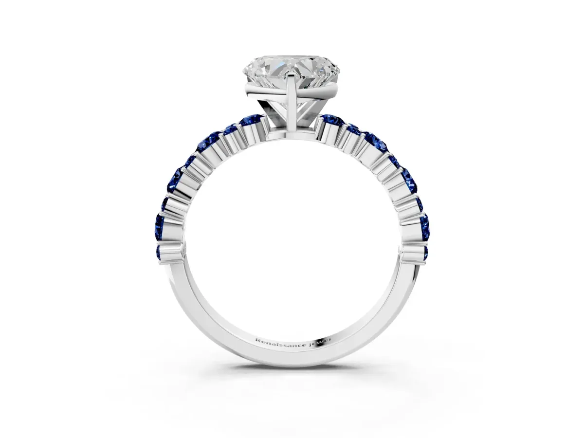 Heart Cut Diamond Side Stone Solitaire Ring with Round Blue Sapphire and Four-Prong Setting White gold