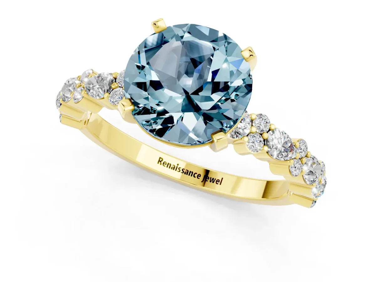 Round Cut Aquamarine Side Stone Solitaire Ring with Round and Four-Prong Setting Yellow gold