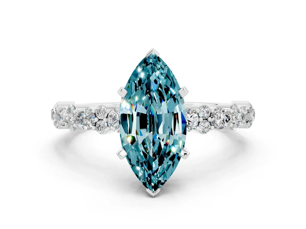 Marquise Cut Blue Topaz Side Stone Solitaire Ring with Round and Four-Prong Setting White gold