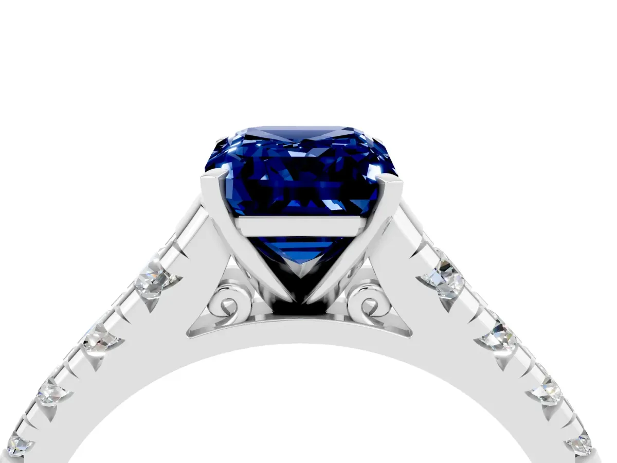 Emerald Cut Blue Sapphire Cathedral Solitaire Ring with Round Pavé Band Platinum