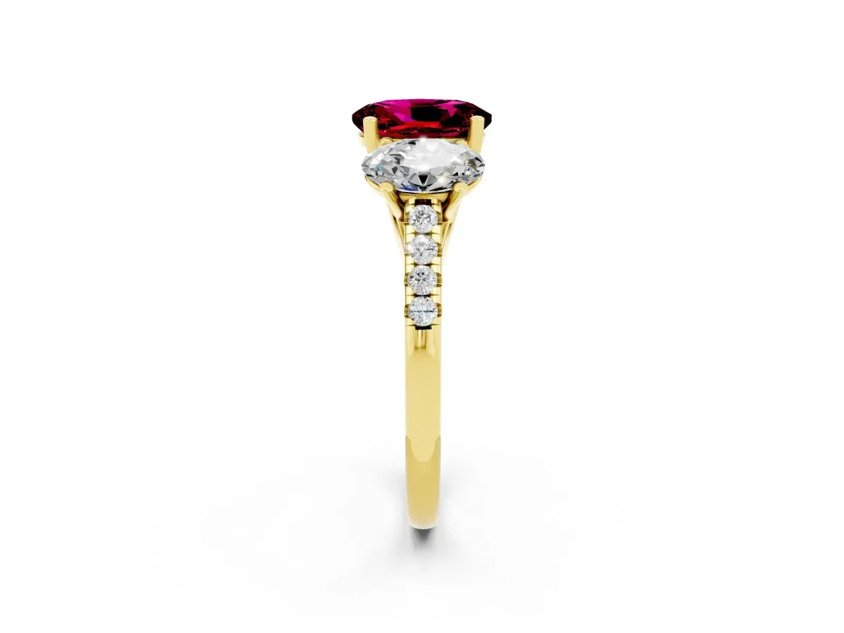 Three-Stone Oval Cut Garnet Ring with Round Pavé Band and Prong Setting Yellow gold