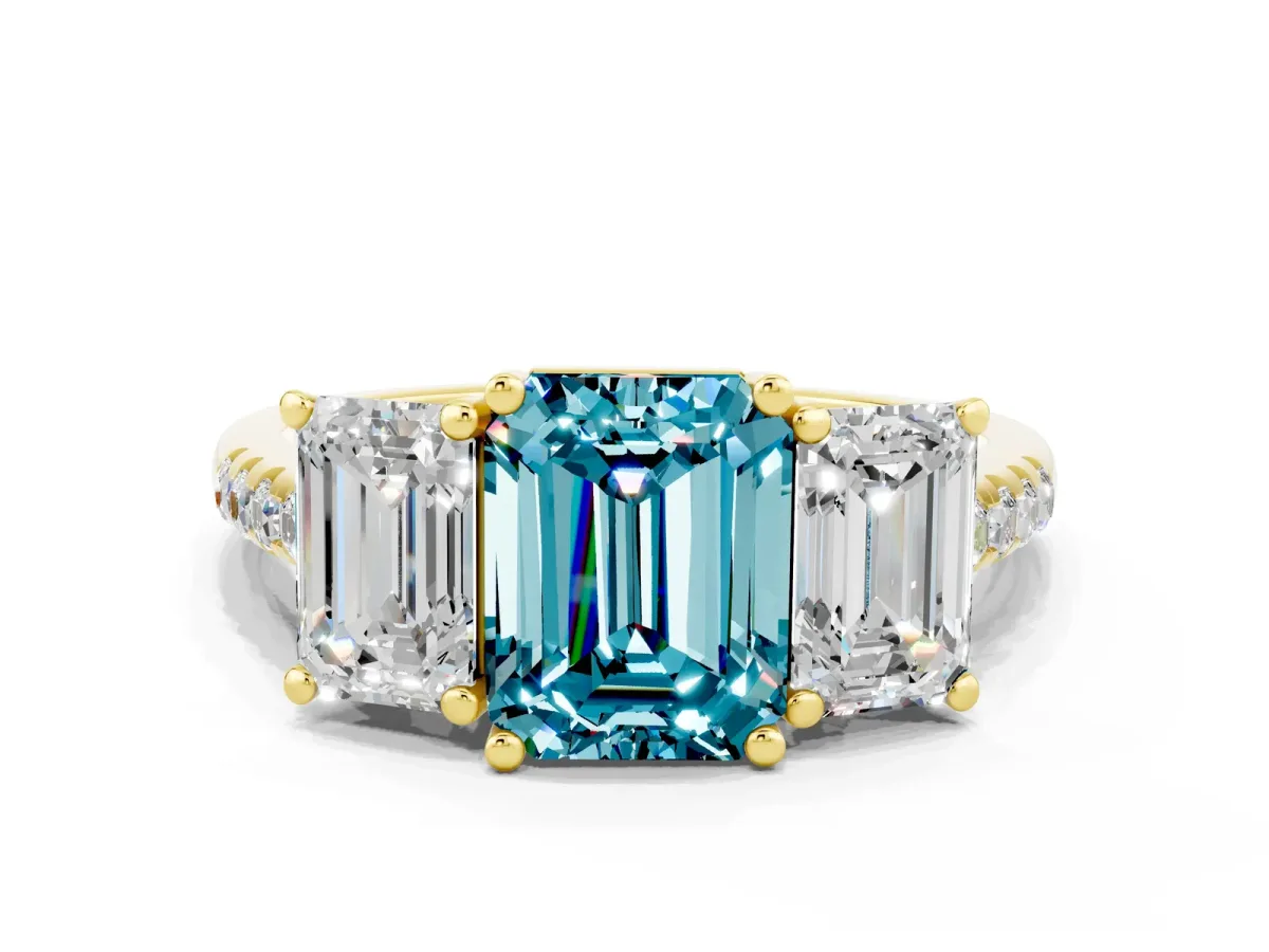 Three-Stone Emerald Cut Blue Topaz Ring with Round Pavé Band and Prong Setting Yellow gold