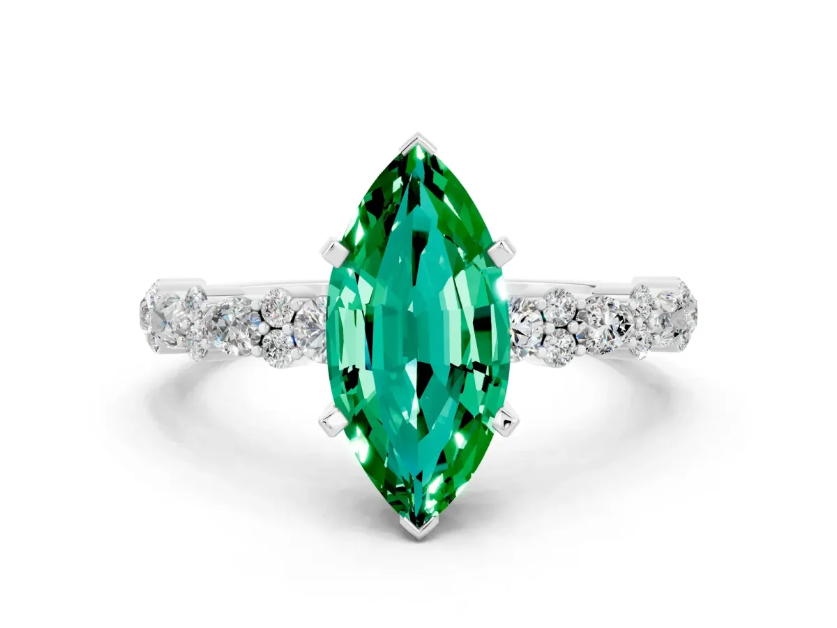 Marquise Cut Emerald Side Stone Solitaire Ring with Round and Four-Prong Setting White gold