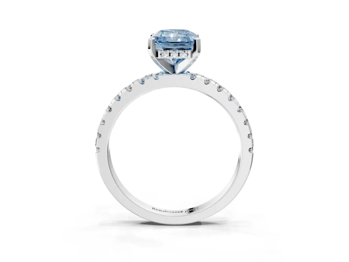 Fancy Blue Radiant Cut Diamond Solitaire Ring with Round Pavé Band and Four-Prong Setting Silver