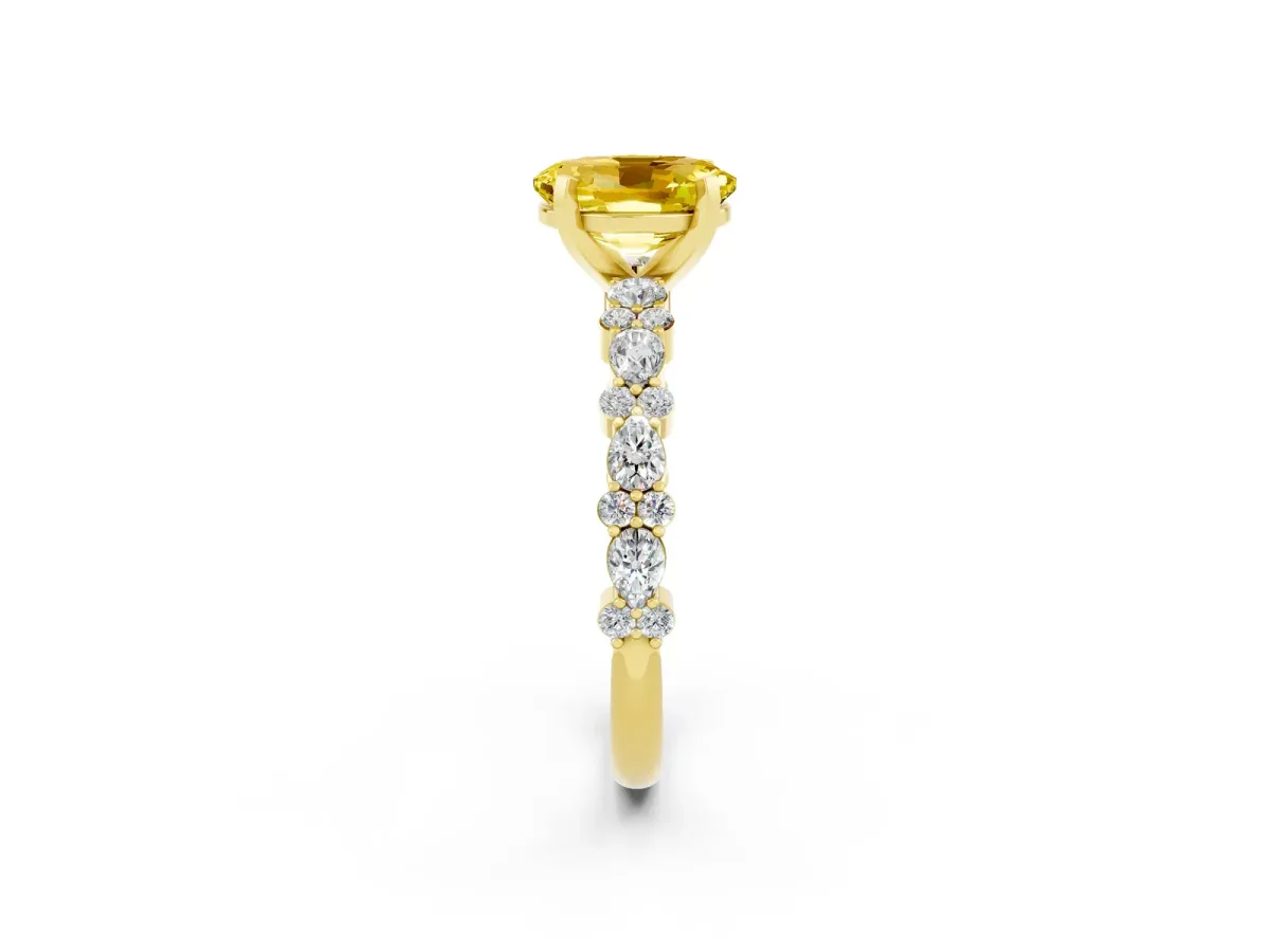 Oval Cut Yellow Sapphire Side Stone Solitaire Ring with Round and Four-Prong Setting Yellow gold