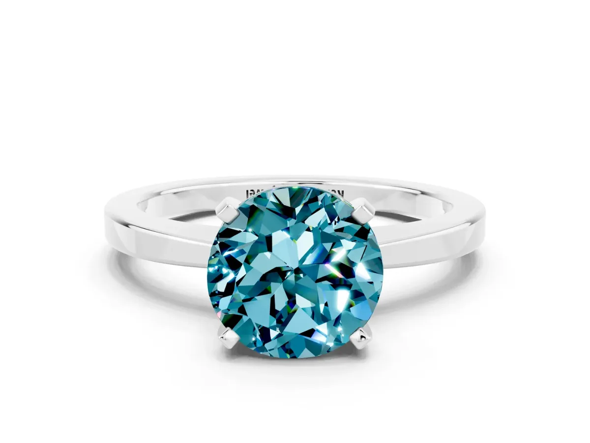 Round Cut Blue Topaz Solitaire Engagement Ring with Classic Band and Four-Prong Setting Silver