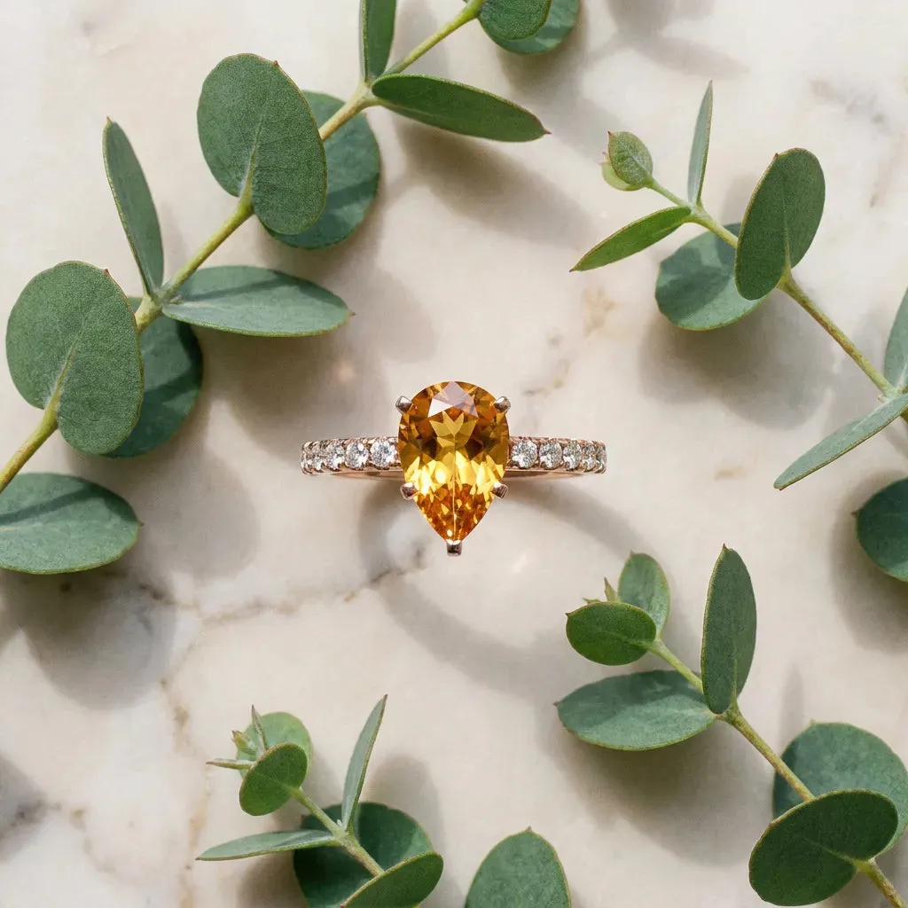 Pear Cut Citrine Solitaire Ring with Round Pavé Band and Four-Prong Setting Rose gold