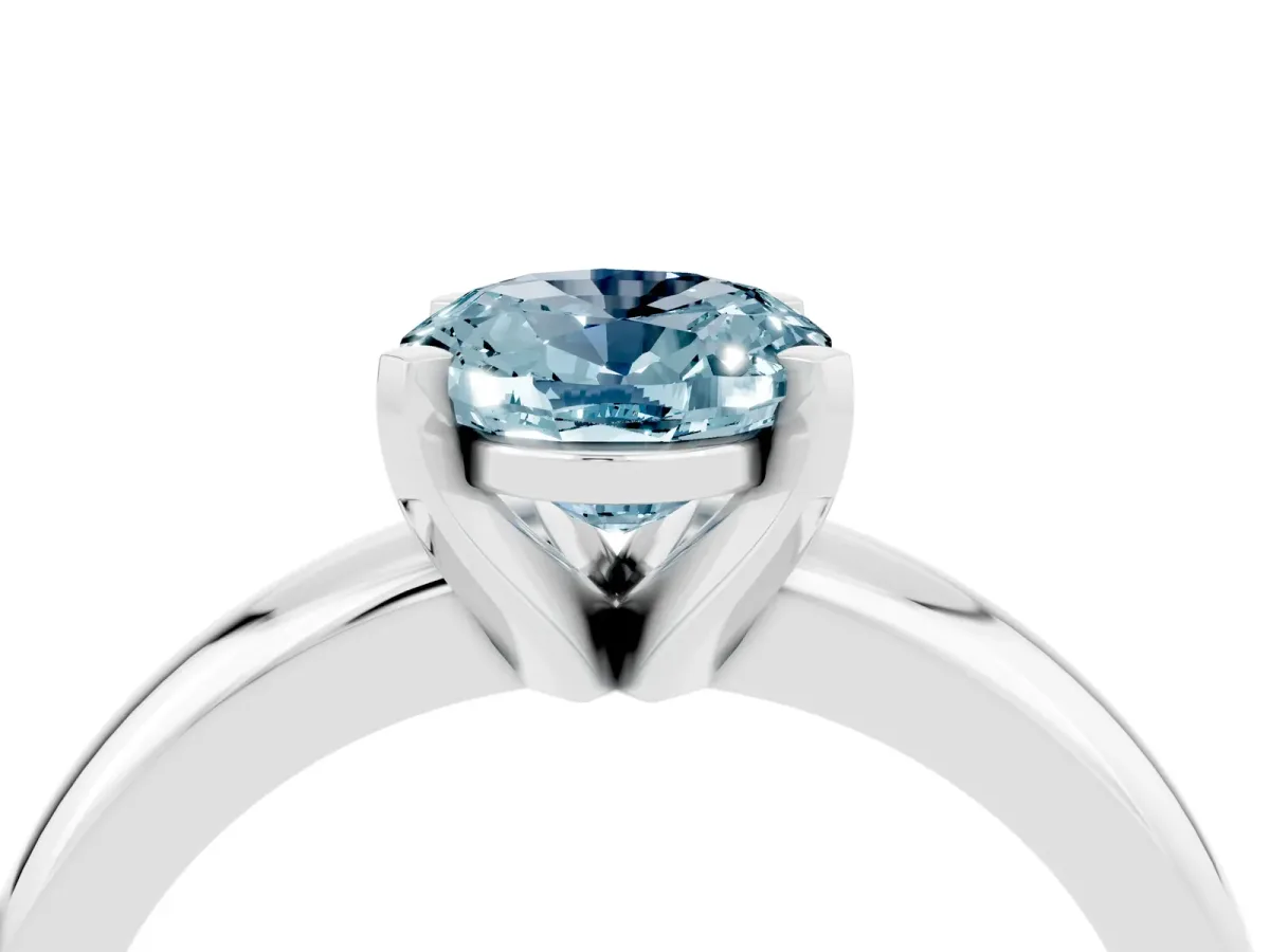 Oval Cut Aquamarine Solitaire Engagement Ring with Round Band and Four-Prong Setting Platinum